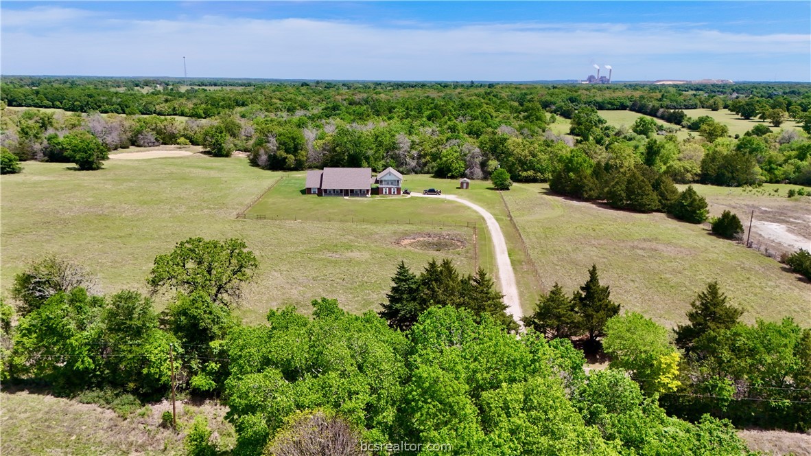10432 Sammys Road Bremond, TX 76629 - Photo 1 of 47 a view of a outdoor space and a lake view