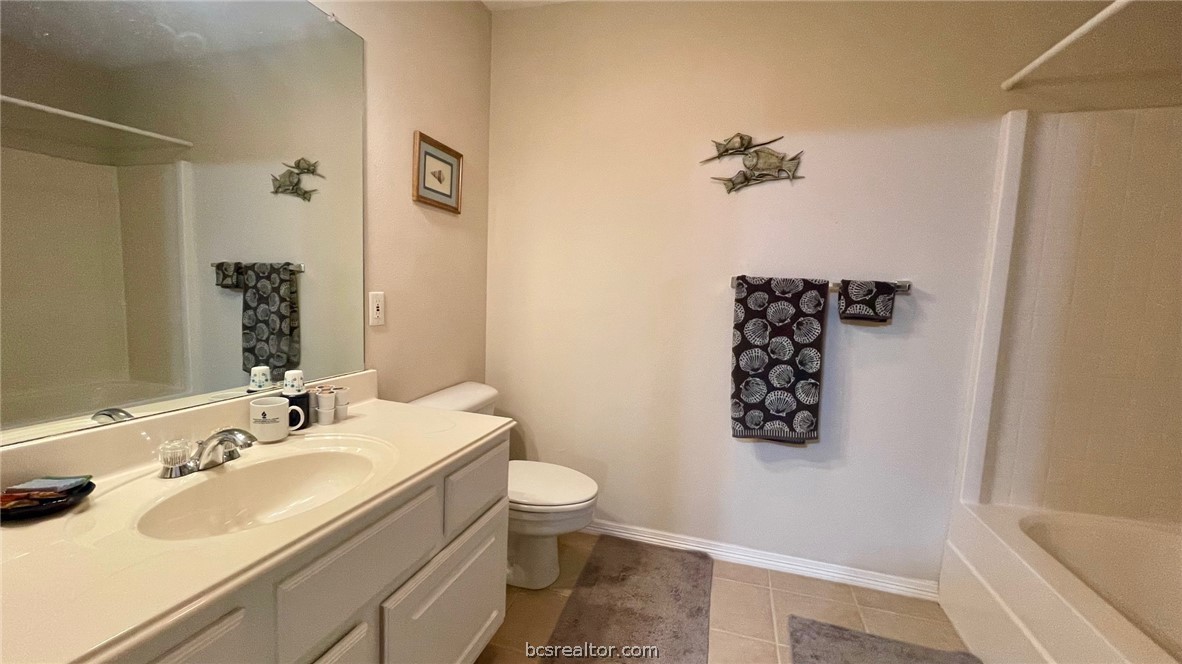 10432 Sammys Road Bremond, TX 76629 - Photo 27 of 47 a bathroom with a sink toilet and shower