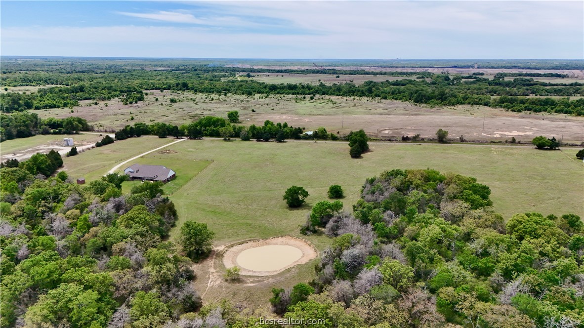 10432 Sammys Road Bremond, TX 76629 - Photo 40 of 47 a view of a lake with a city view