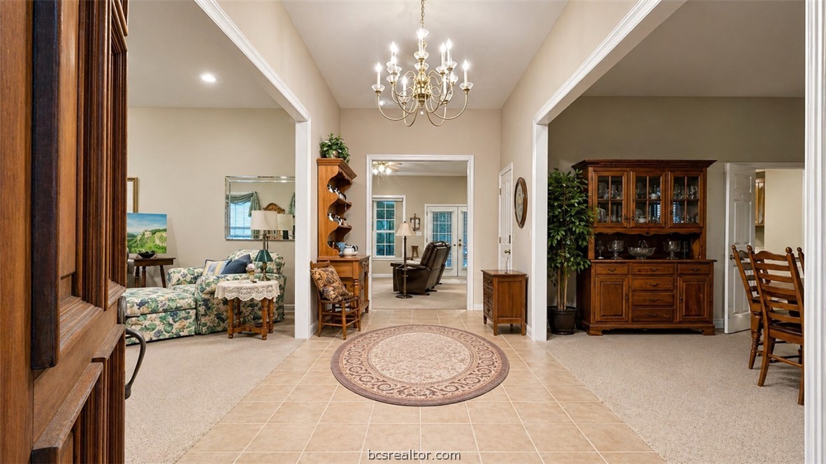 10432 Sammys Road Bremond, TX 76629 - Photo 4 of 47 a view of a livingroom with furniture and chandelier