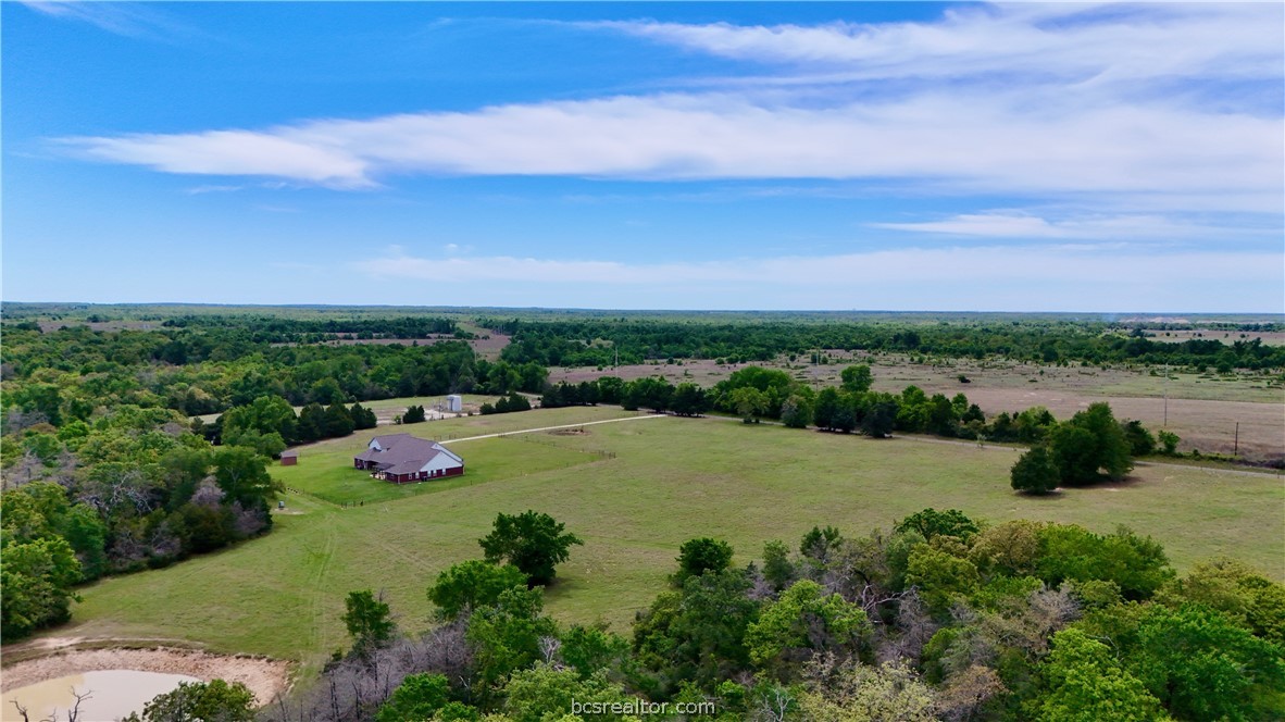 10432 Sammys Road Bremond, TX 76629 - Photo 46 of 47 an aerial view of a house with garden space and outdoor seating