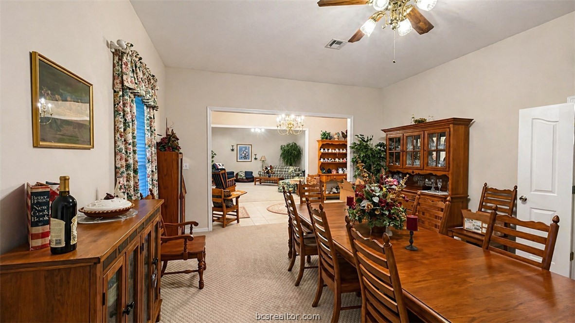 10432 Sammys Road Bremond, TX 76629 - Photo 9 of 47 a view of a livingroom with furniture and a flat screen tv