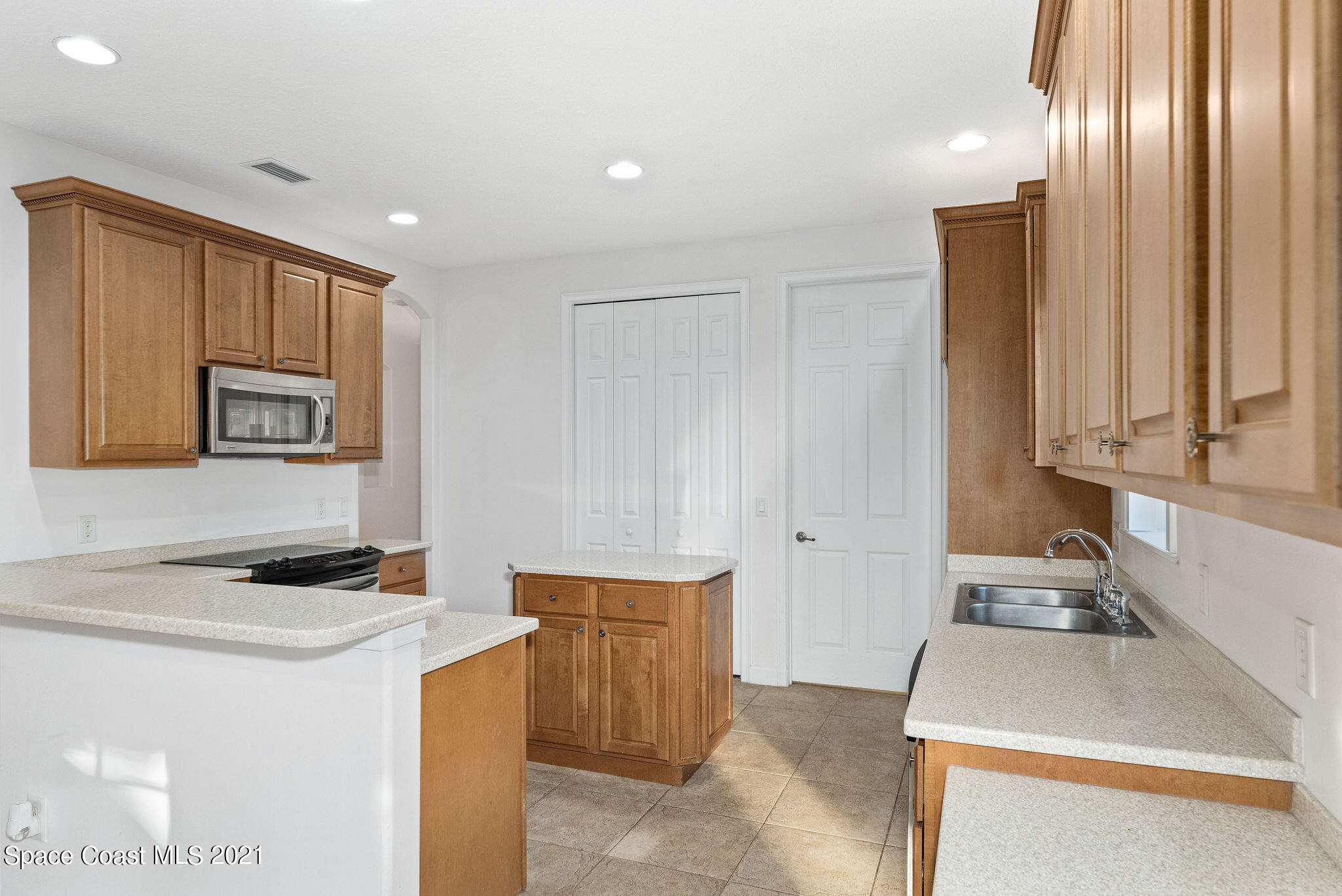 3748 Turtle Mound Road Melbourne, FL 32934 - Photo 11 of 68 a room with furniture and window
