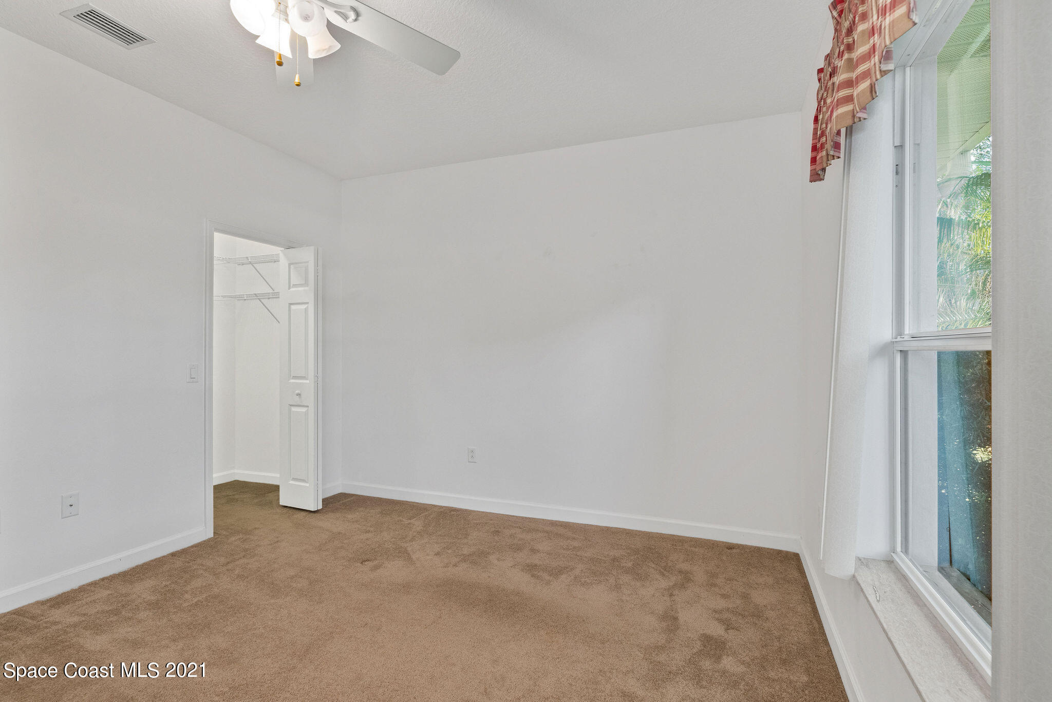 3748 Turtle Mound Road Melbourne, FL 32934 - Photo 18 of 68 a view of an empty room
