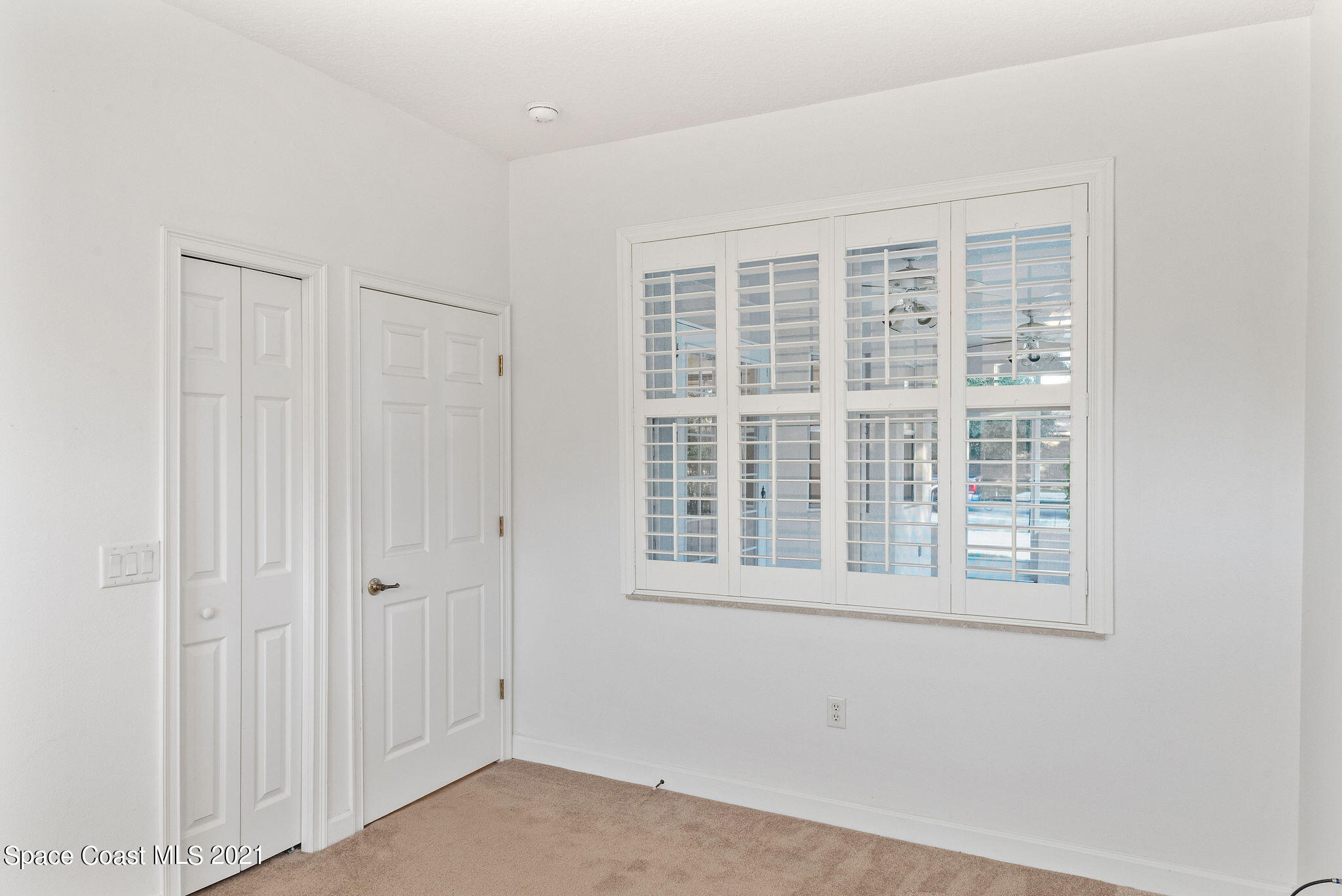 3748 Turtle Mound Road Melbourne, FL 32934 - Photo 24 of 68 a view of empty room with windows