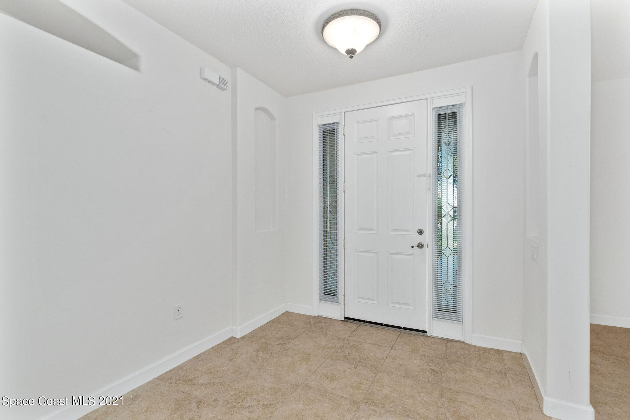 3748 Turtle Mound Road Melbourne, FL 32934 - Photo 4 of 68 a view of an empty room