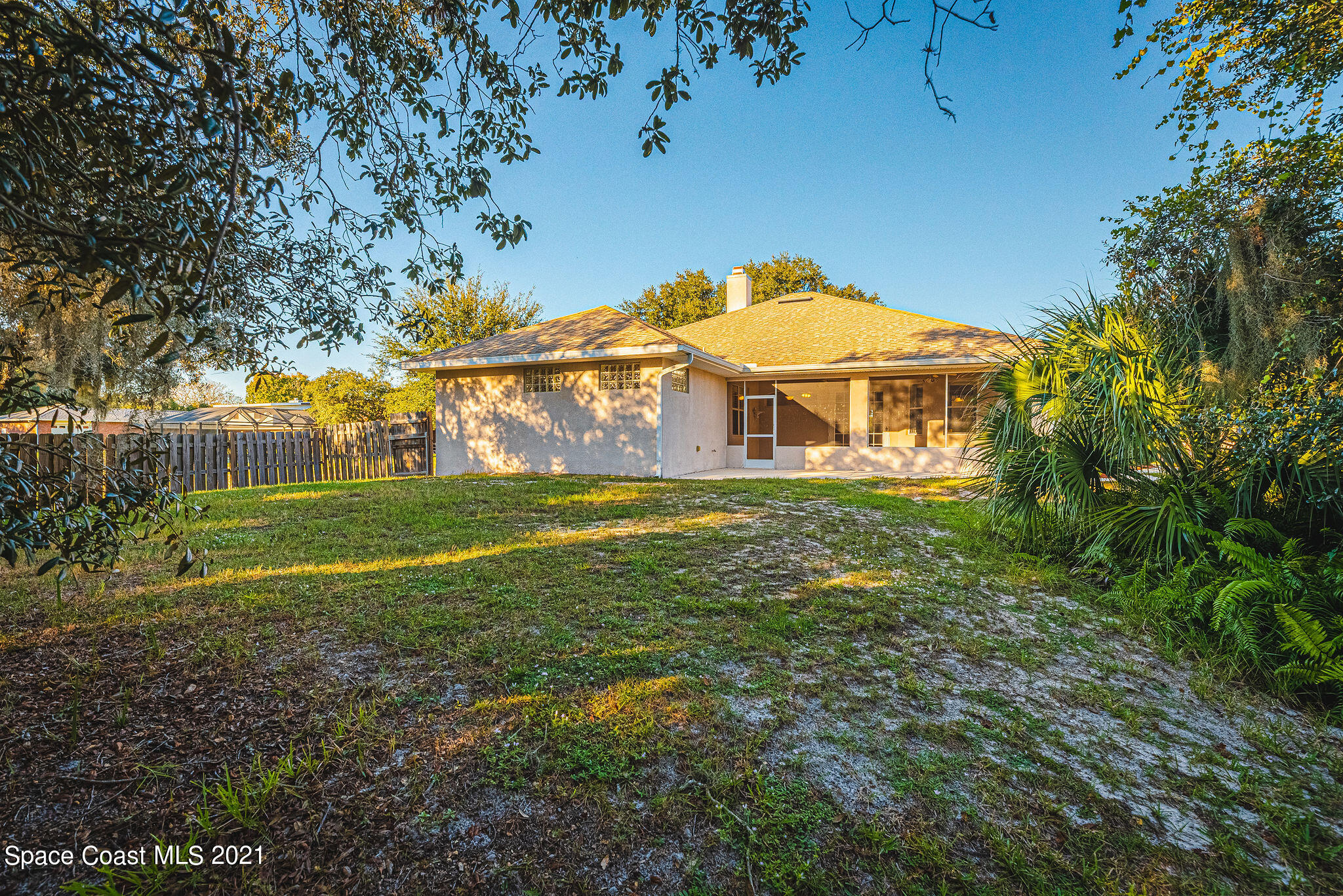 3748 Turtle Mound Road Melbourne, FL 32934 - Photo 40 of 68 a view of a house with a big yard