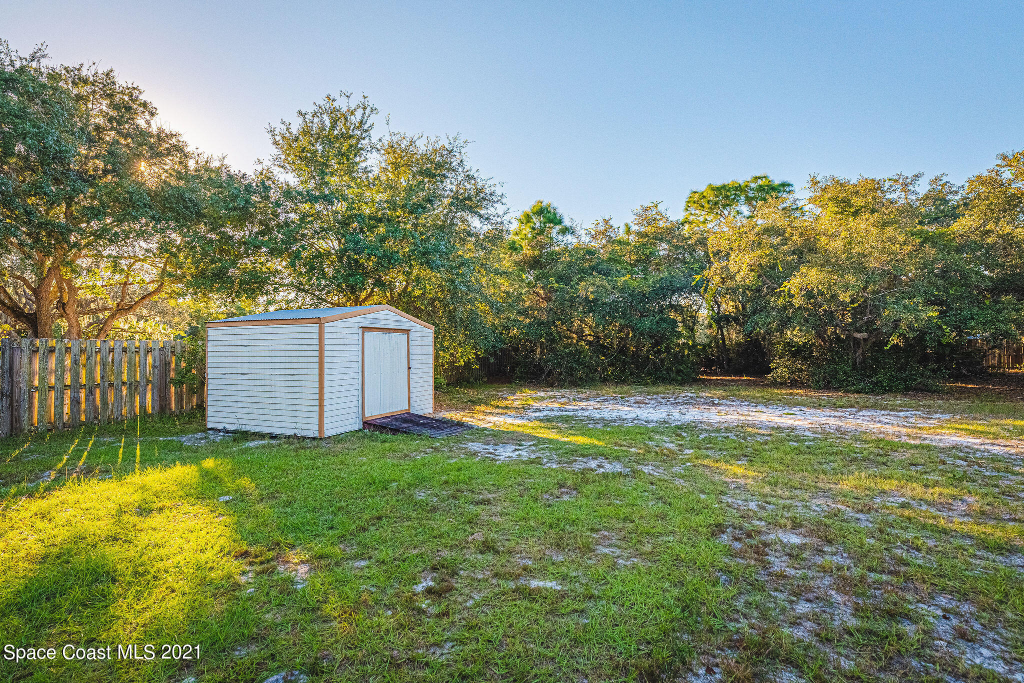 3748 Turtle Mound Road Melbourne, FL 32934 - Photo 42 of 68 a view of a house with a yard