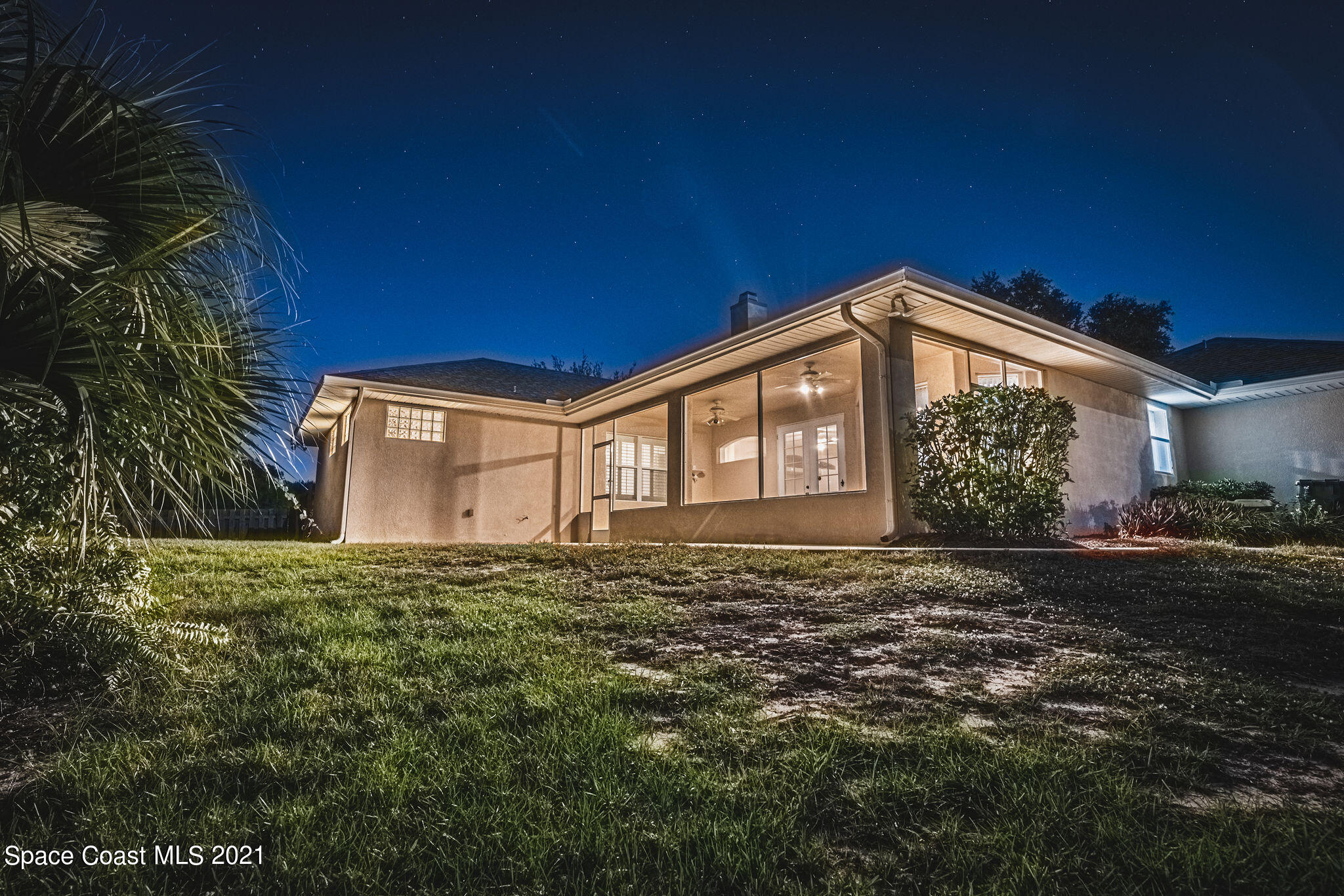 3748 Turtle Mound Road Melbourne, FL 32934 - Photo 51 of 68 a view of a house with a yard