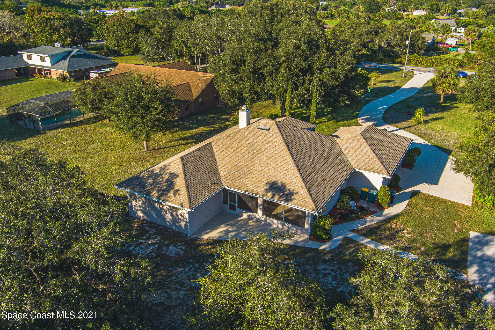 3748 Turtle Mound Road Melbourne, FL 32934 - Photo 65 of 68 an aerial view of a house with outdoor space