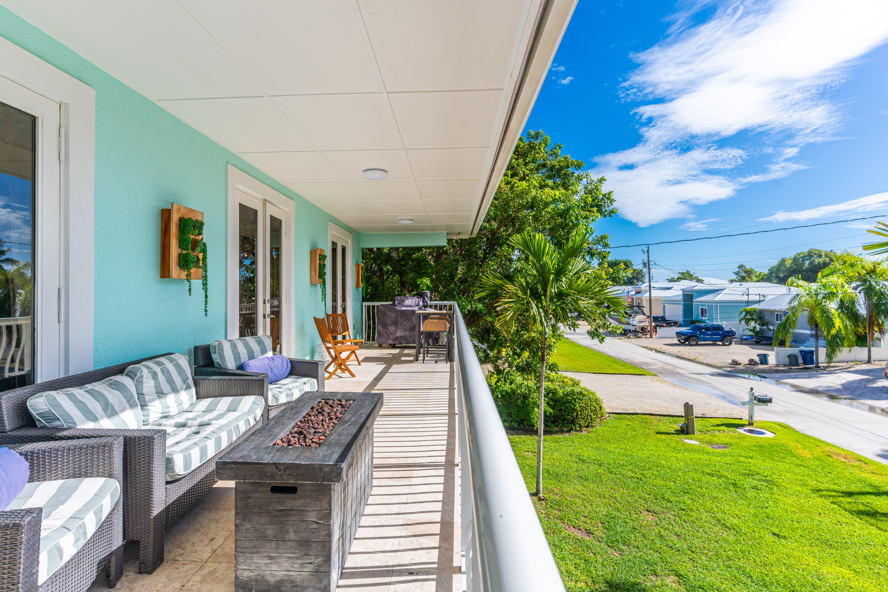 427 4th Road Key Largo, FL 33037 - Photo 27 of 51 a view of a backyard with sitting area