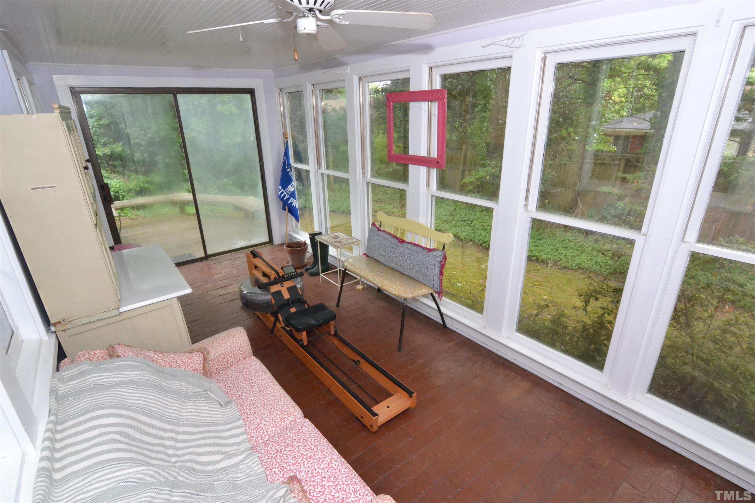 1004 Brooks Avenue Raleigh, NC 27607 - Photo 13 of 17 a bedroom with furniture and a large window