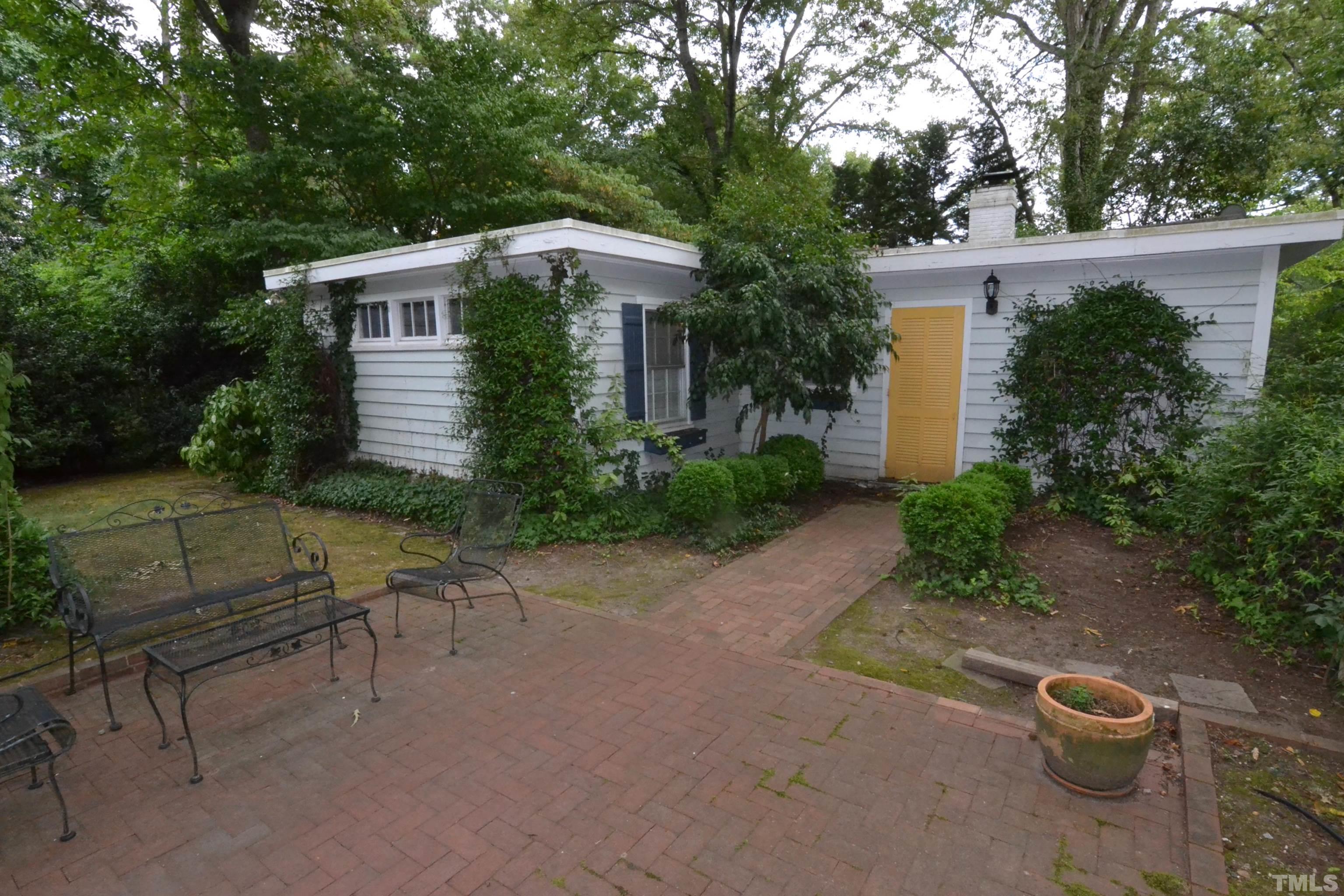 1004 Brooks Avenue Raleigh, NC 27607 - Photo 15 of 17 a front view of a house with a yard