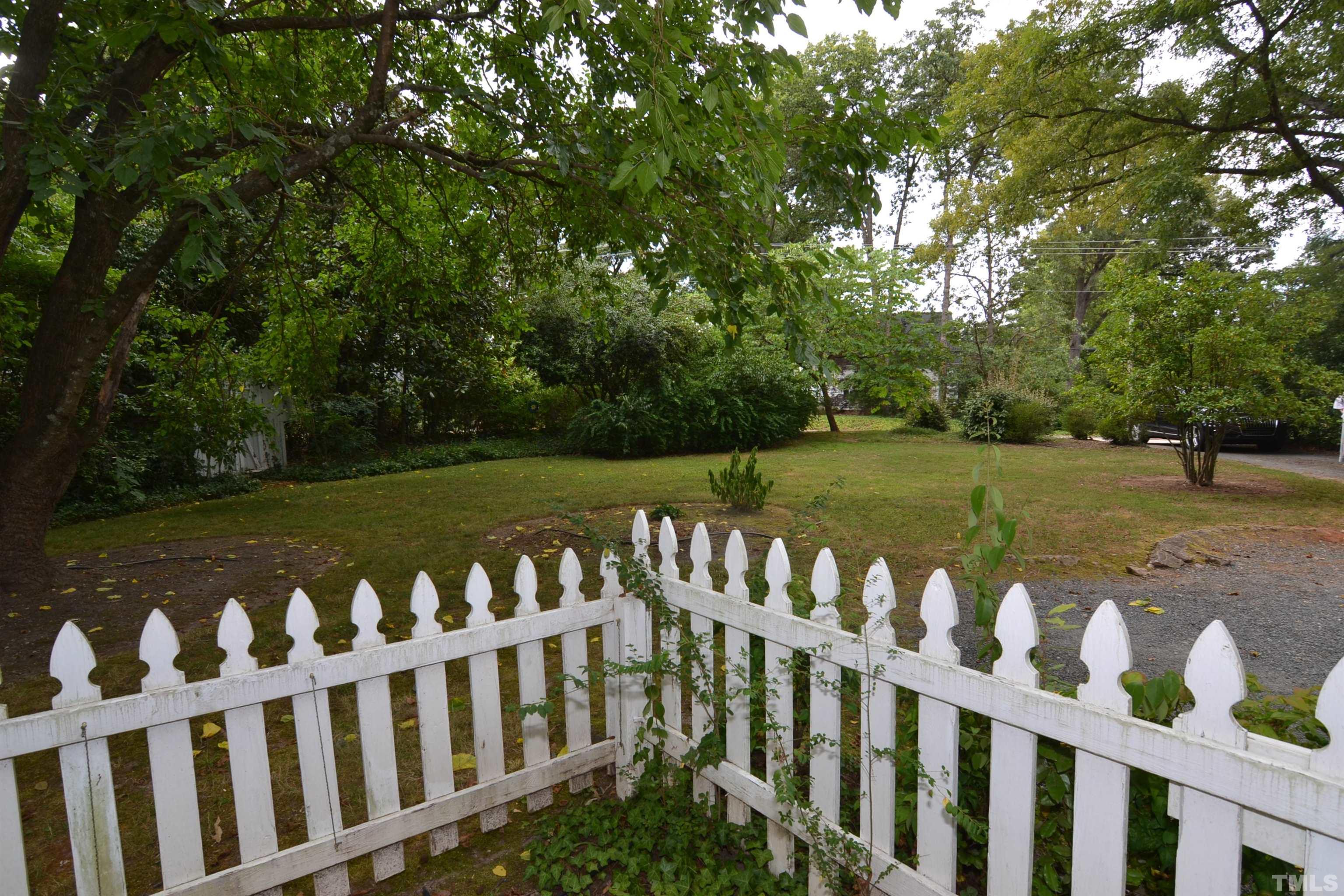 1004 Brooks Avenue Raleigh, NC 27607 - Photo 16 of 17 a view of a wooden fence