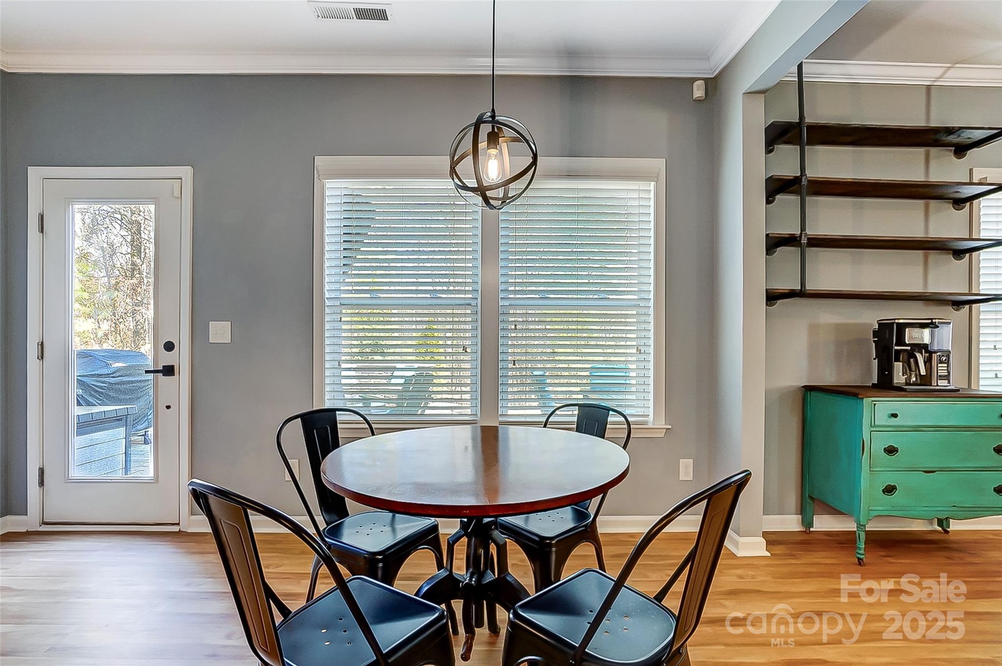 2222 Bluebell Way Fort Mill, SC 29708 - Photo 13 of 41 a view of a dining room with furniture and wooden floor