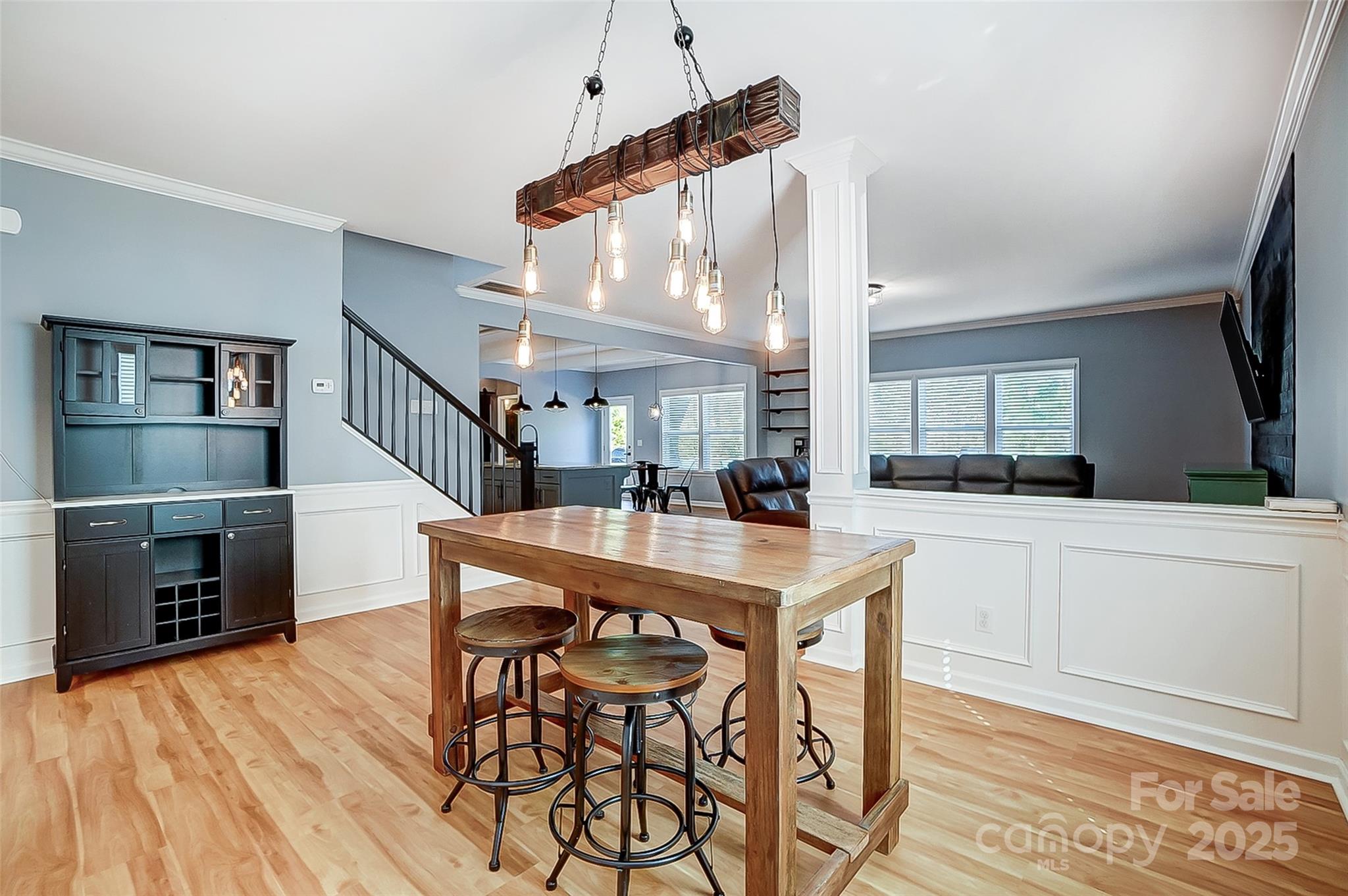 2222 Bluebell Way Fort Mill, SC 29708 - Photo 15 of 41 a kitchen with stainless steel appliances kitchen island a table and chairs in it