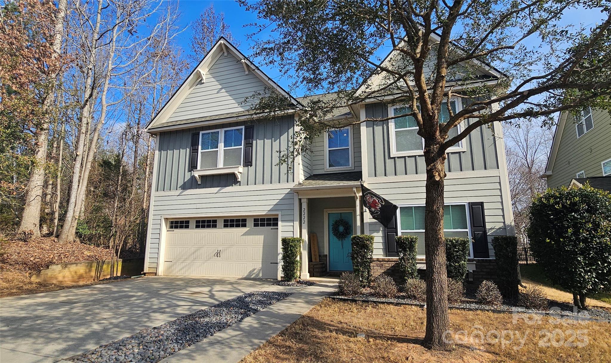 2222 Bluebell Way Fort Mill, SC 29708 - Photo 2 of 41 a front view of a house with a tree