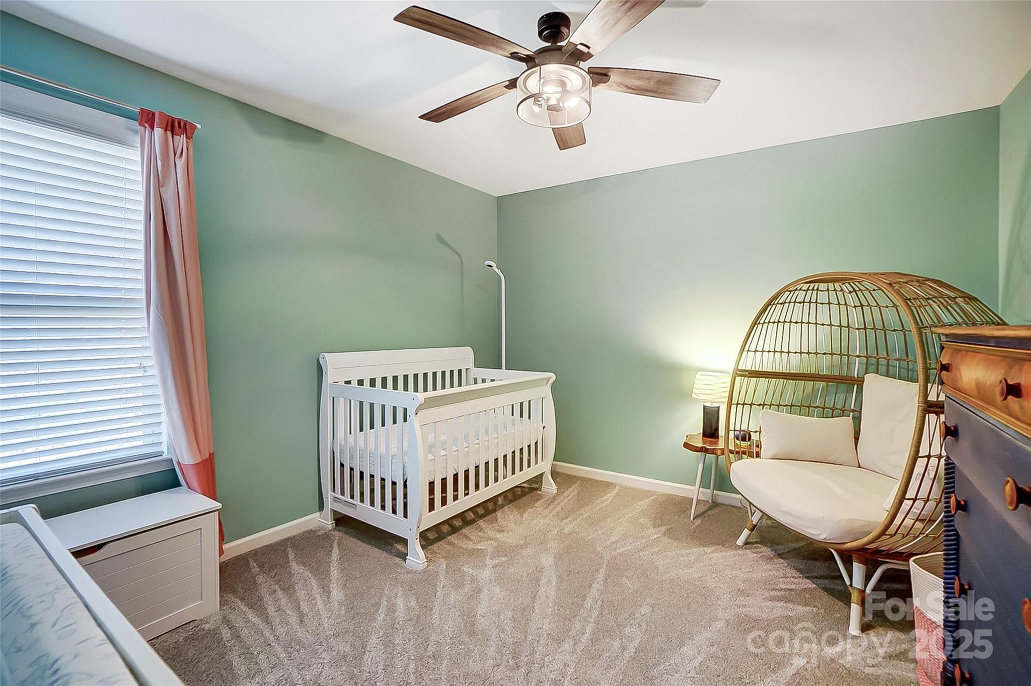 2222 Bluebell Way Fort Mill, SC 29708 - Photo 30 of 41 a bedroom with a bed window and a mirror