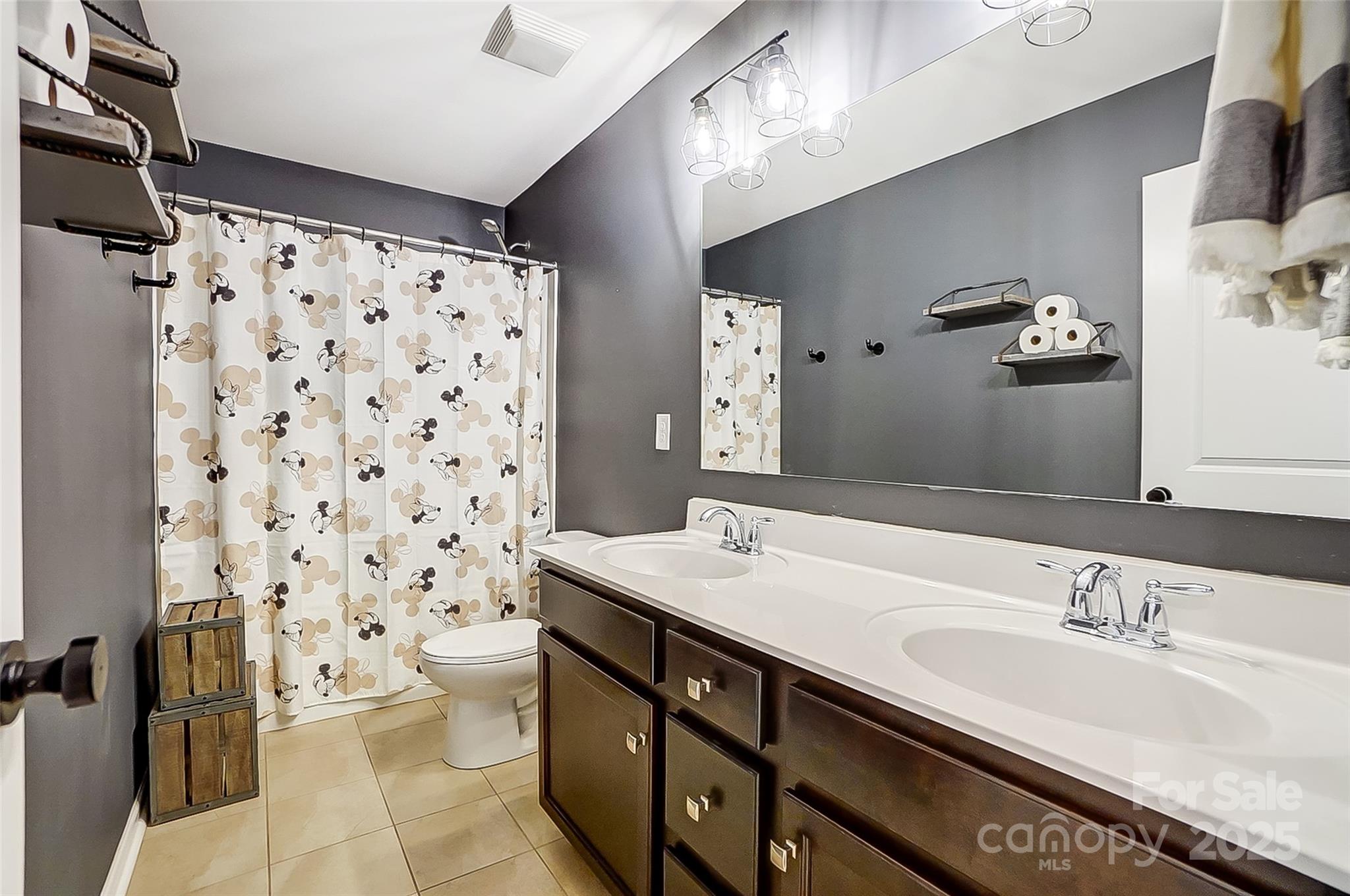 2222 Bluebell Way Fort Mill, SC 29708 - Photo 32 of 41 a bathroom with a double vanity sink toilet and shower