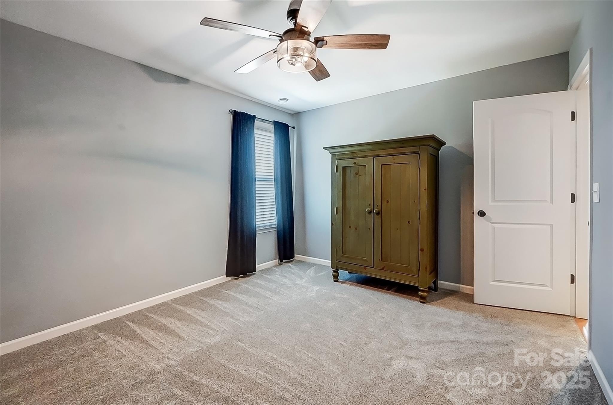2222 Bluebell Way Fort Mill, SC 29708 - Photo 34 of 41 a view of a livingroom with a chandelier fan