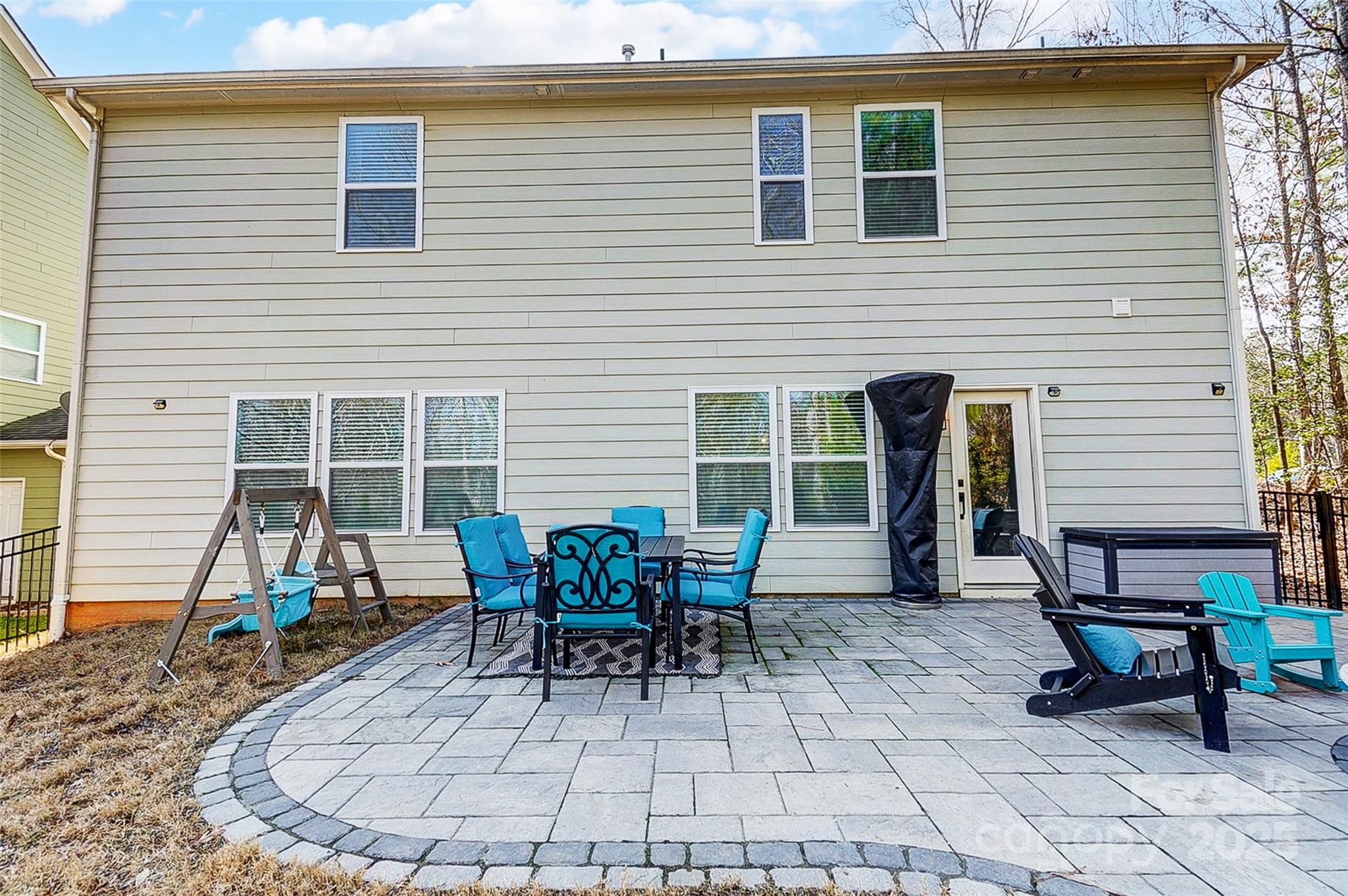 2222 Bluebell Way Fort Mill, SC 29708 - Photo 36 of 41 a view of a house with backyard sitting area