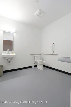 a bathroom with a toilet