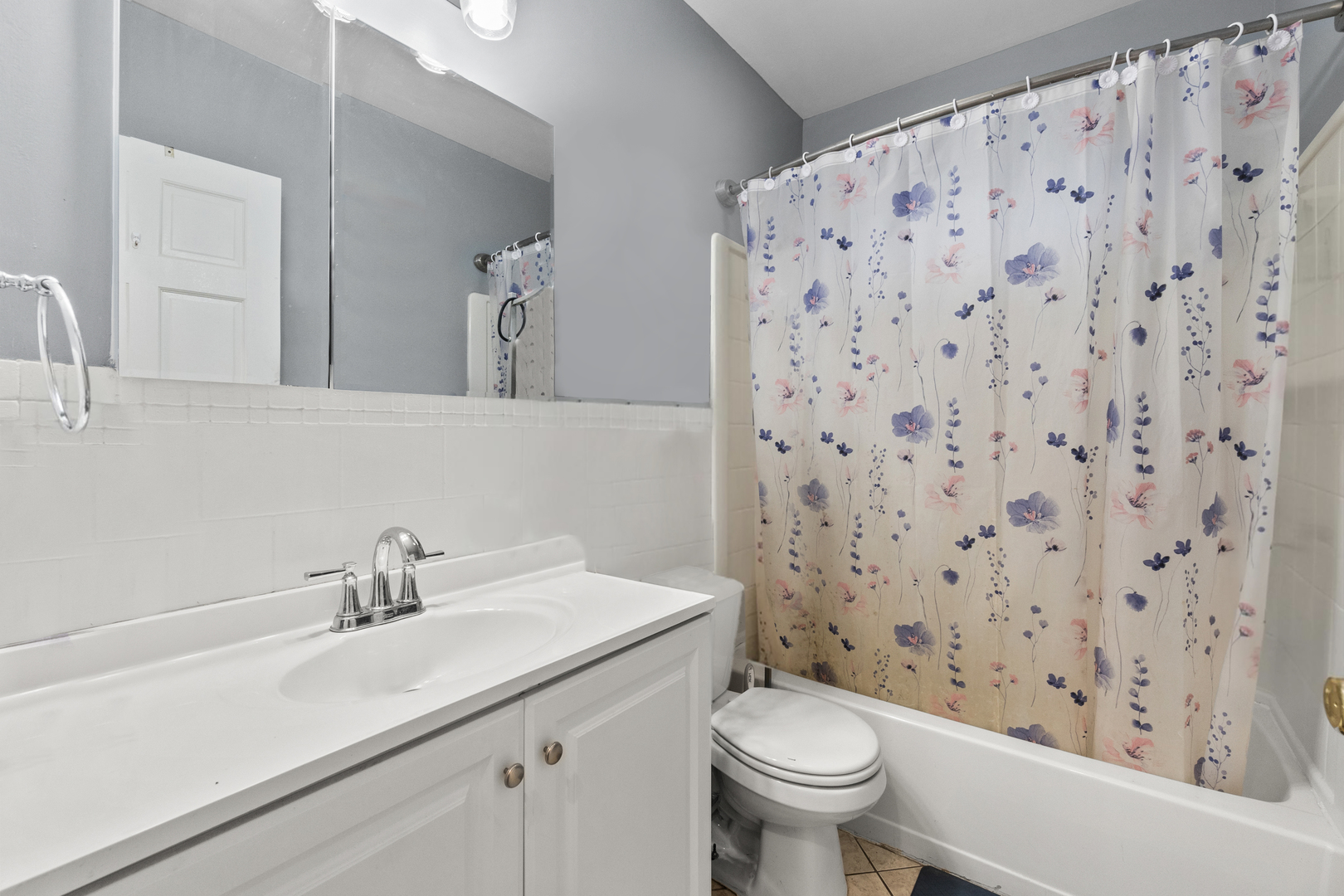 18275 Ada Street Lansing, IL 60438 - Photo 11 of 18 a bathroom with a sink toilet and a mirror