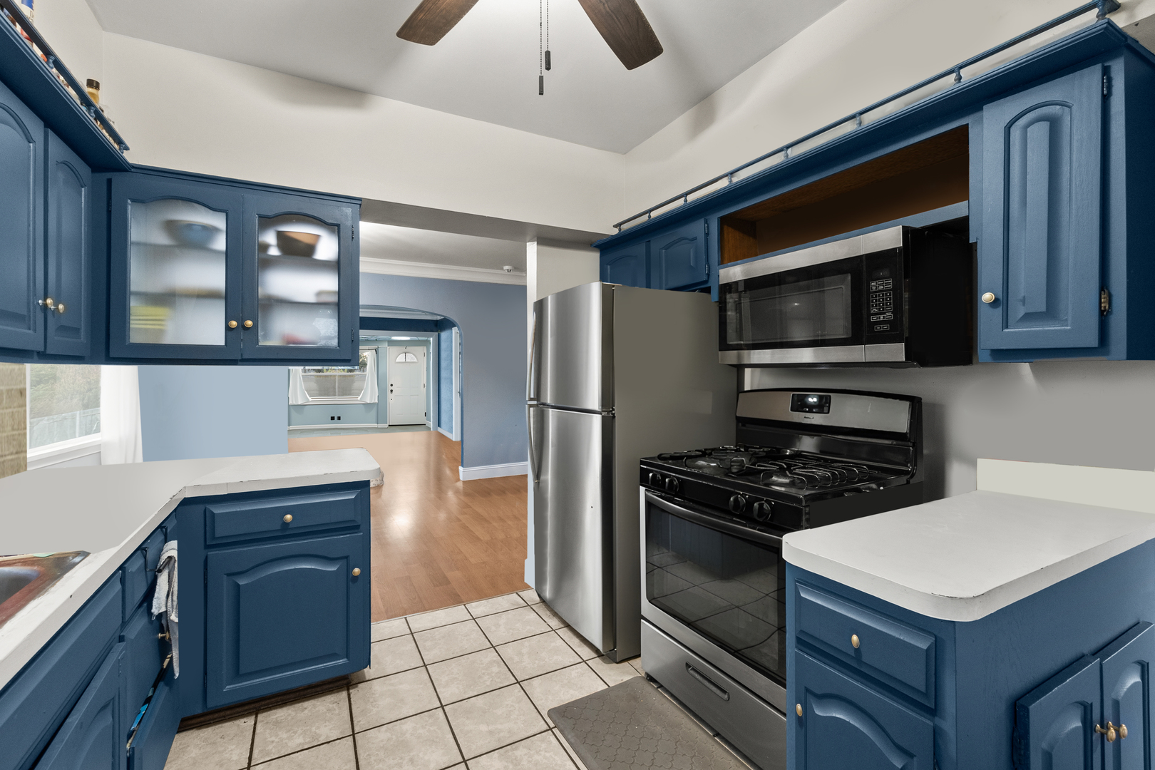 18275 Ada Street Lansing, IL 60438 - Photo 9 of 18 a kitchen with a refrigerator stove and microwave