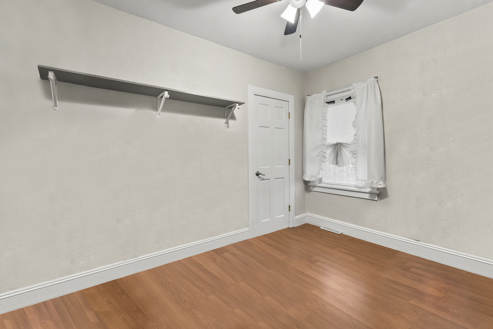 18275 Ada Street Lansing, IL 60438 - Photo 10 of 18 a view of an empty room with a window