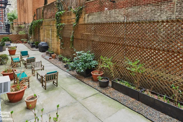 a view of a livingroom with furniture and a chandelier