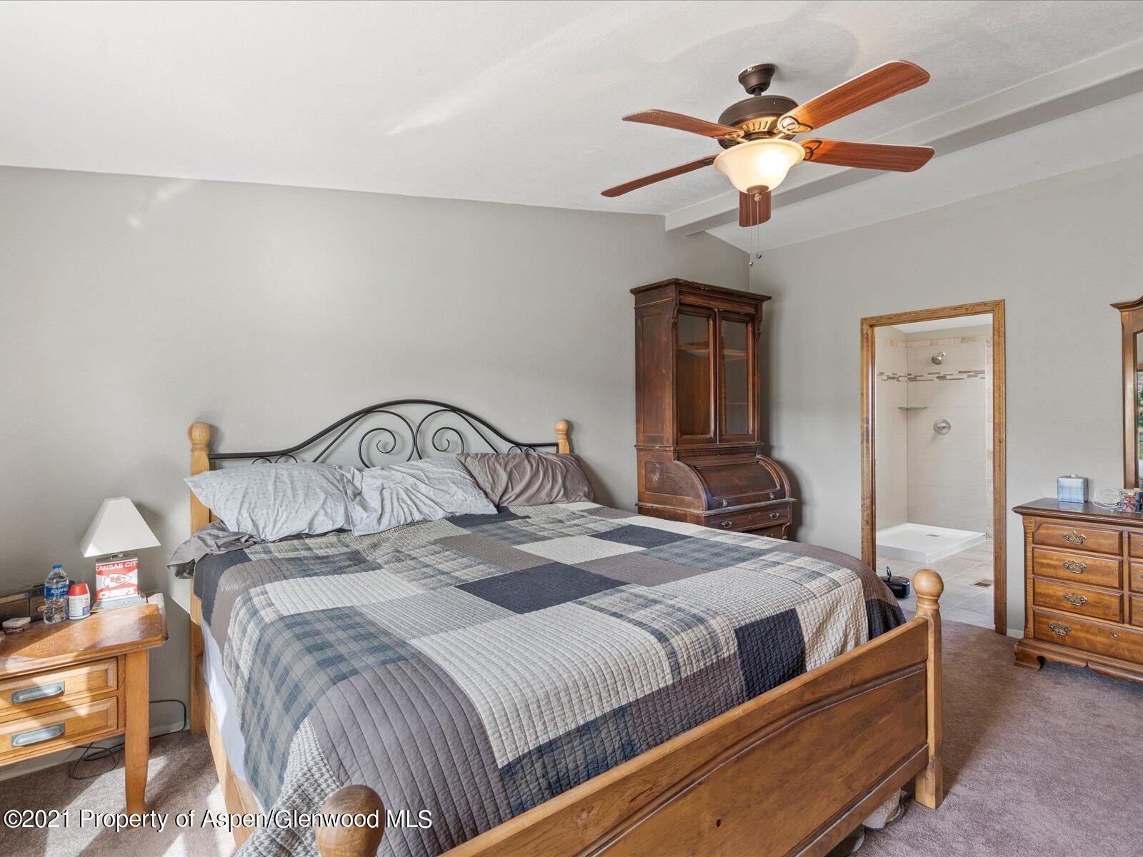 4300 Grass Mesa Road Rifle, CO 81650 - Photo 20 of 45 a bedroom with a bed and dresser