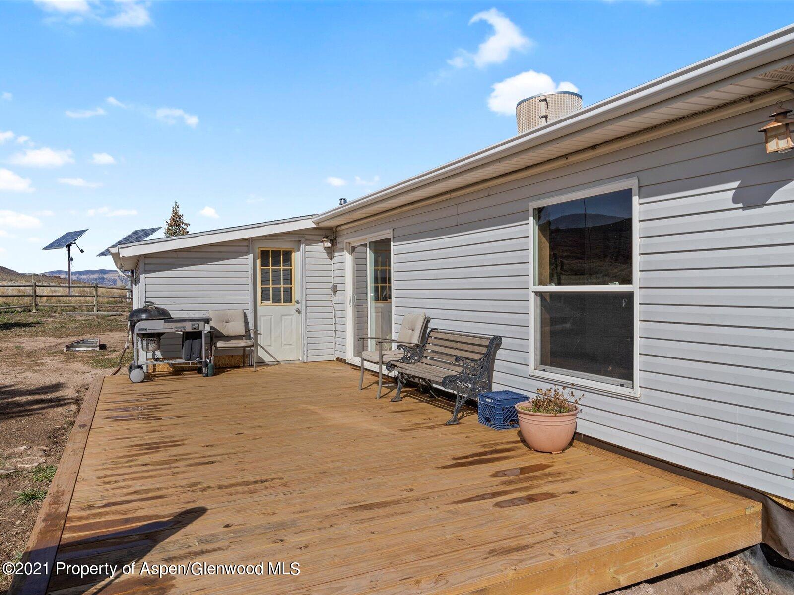 4300 Grass Mesa Road Rifle, CO 81650 - Photo 4 of 45 a view of a house with patio