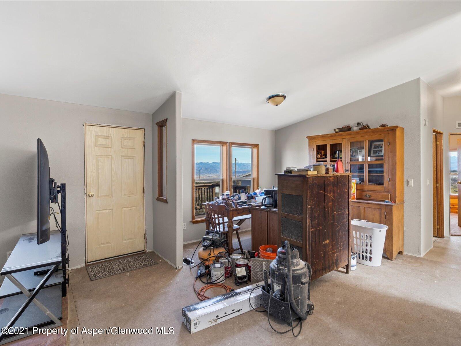 4300 Grass Mesa Road Rifle, CO 81650 - Photo 7 of 45 a view of a room with gym equipment