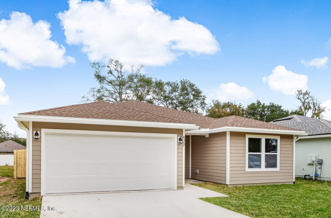 8375 Hewitt Street Jacksonville, FL 32244 - Photo 2 of 25 Front of Model Home (Located Next Door)