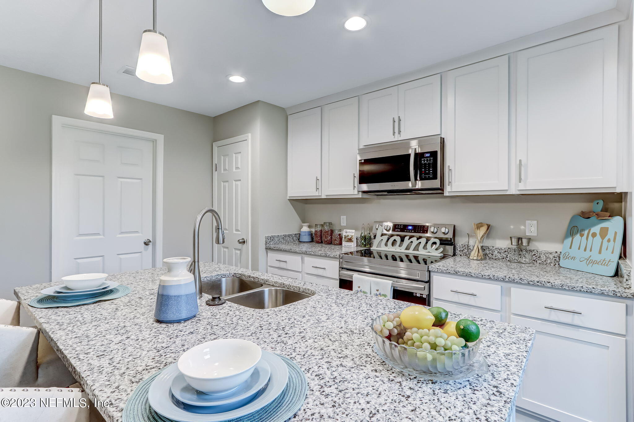 8375 Hewitt Street Jacksonville, FL 32244 - Photo 8 of 25 Kitchen/Laundry