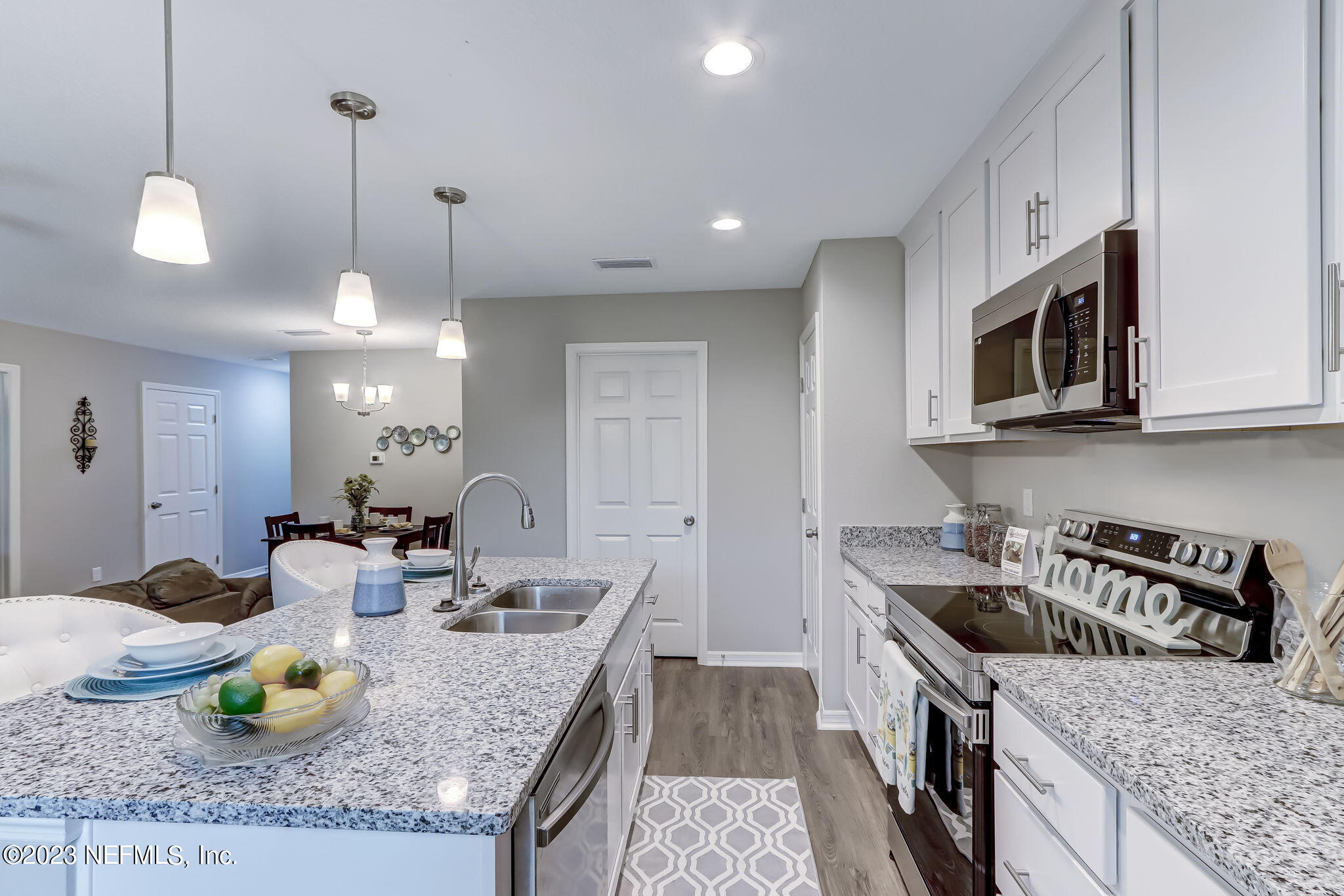 8375 Hewitt Street Jacksonville, FL 32244 - Photo 10 of 25 Kitchen/Dining/Laundry