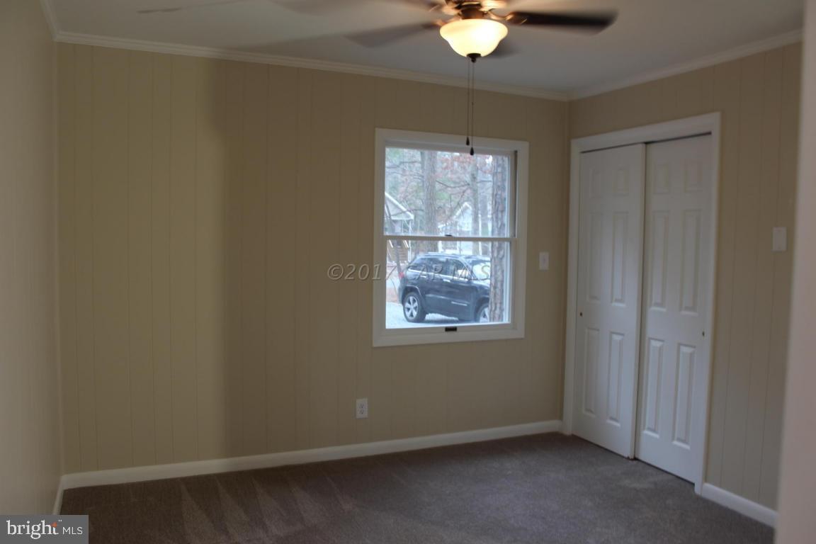 129 Windjammer Road Ocean Pines, MD 21811 - Photo 11 of 36 an empty room with window