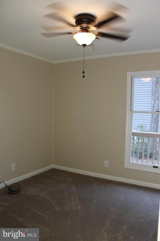 129 Windjammer Road Ocean Pines, MD 21811 - Photo 13 of 36 a view of room with hardwood floor and fan