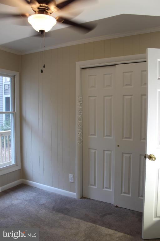 129 Windjammer Road Ocean Pines, MD 21811 - Photo 15 of 36 a view of a livingroom with a chandelier fan
