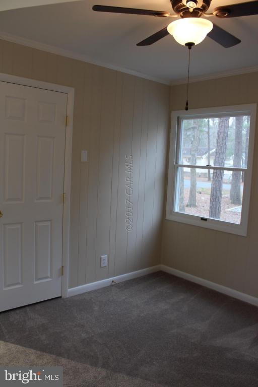 129 Windjammer Road Ocean Pines, MD 21811 - Photo 17 of 36 a view of an empty room with a window