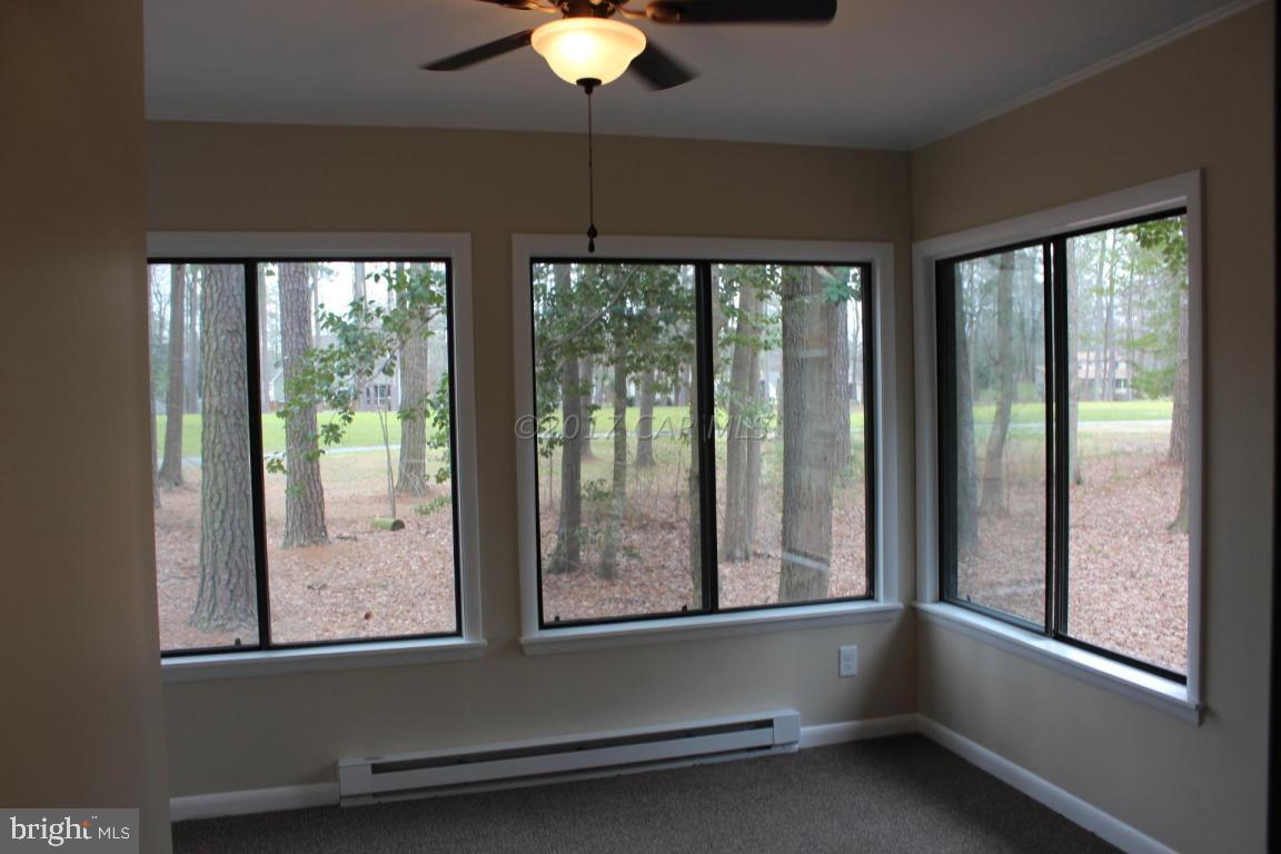 129 Windjammer Road Ocean Pines, MD 21811 - Photo 24 of 36 a view of an empty room with a window