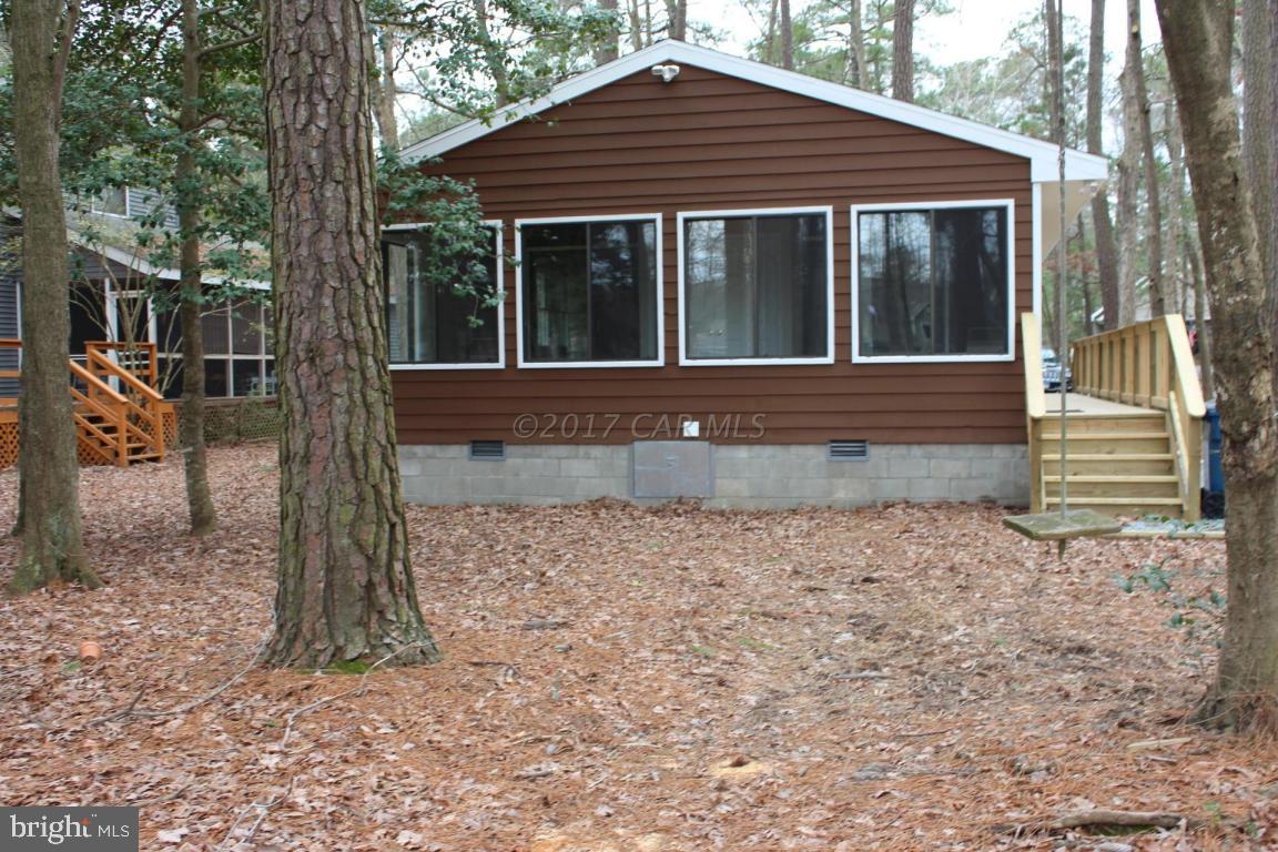 129 Windjammer Road Ocean Pines, MD 21811 - Photo 34 of 36 a view of house with a yard