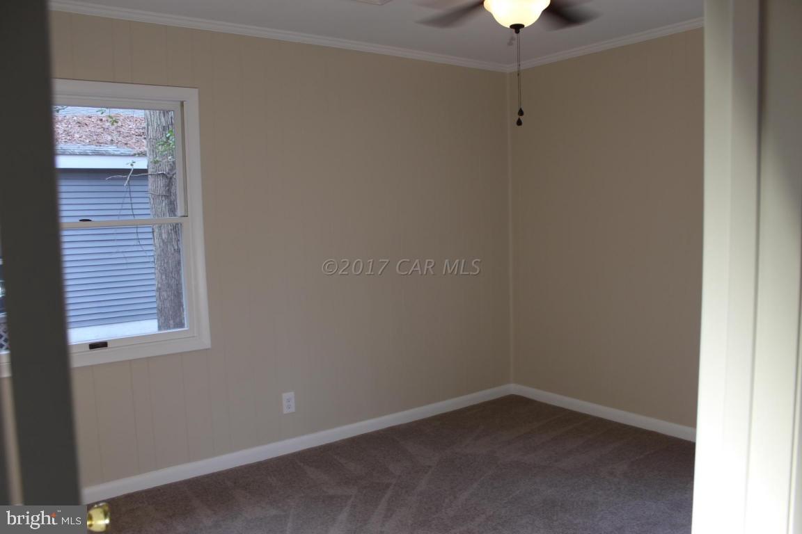 129 Windjammer Road Ocean Pines, MD 21811 - Photo 10 of 36 a room that has a window in it