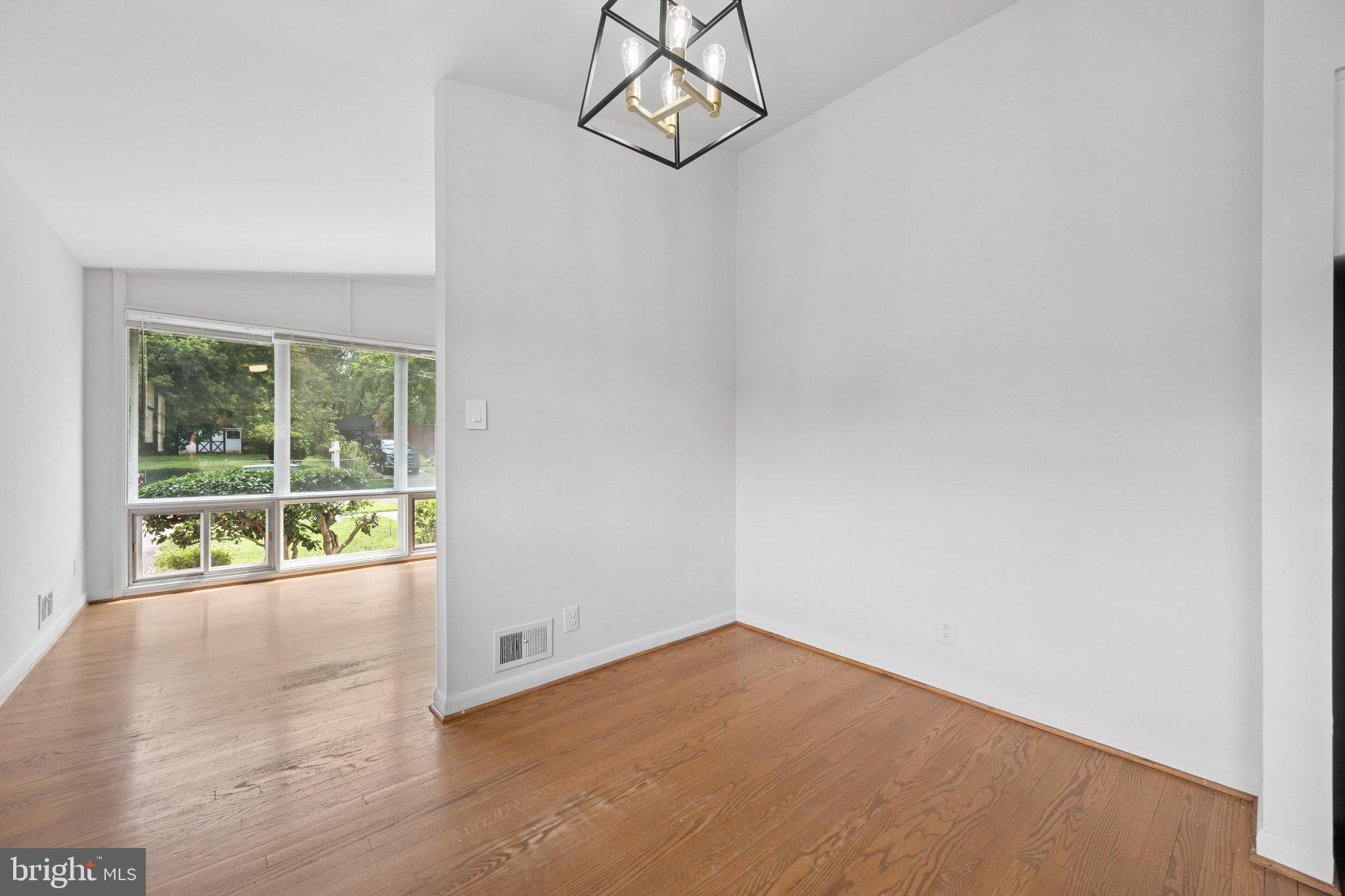 11302 Kenton Place Silver Spring, MD 20902 - Photo 11 of 50 Kitchen & Dining-half wall separates living room