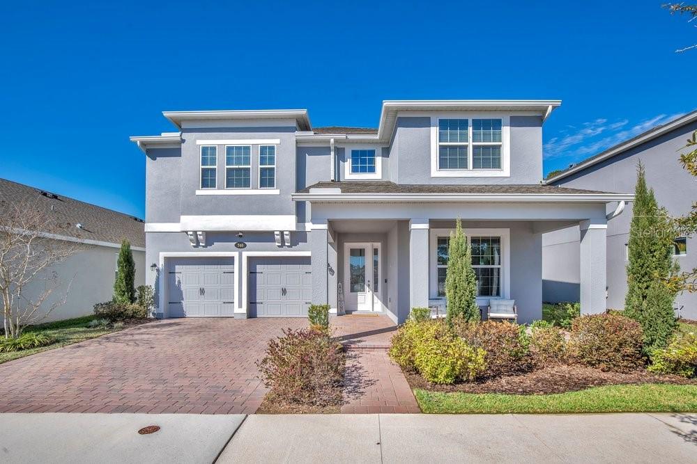 740 Hyperion Drive DeBary, FL 32713 - Photo 1 of 1 a front view of a house with garden