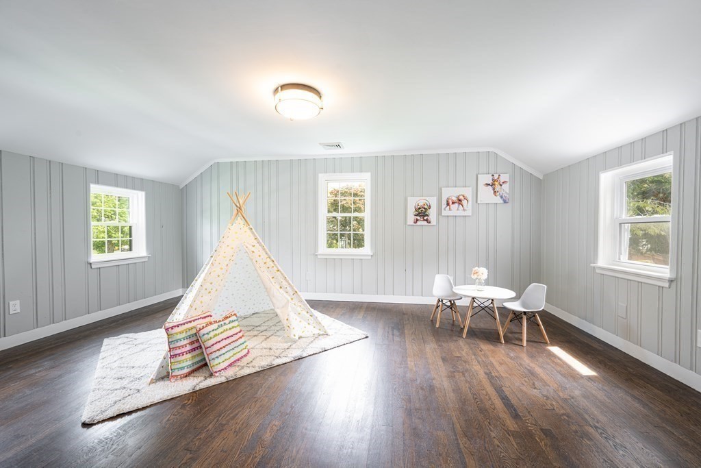 61 Sheffield Road Melrose, MA 02176 - Photo 11 of 21 a living room with furniture and wooden floor