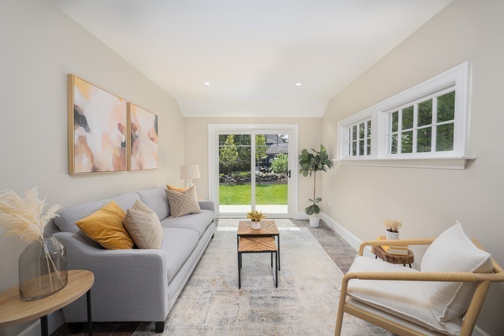 61 Sheffield Road Melrose, MA 02176 - Photo 12 of 21 a living room with furniture and a large window