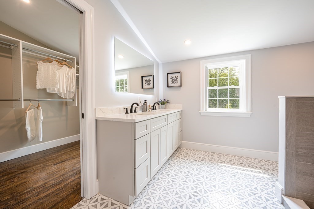 61 Sheffield Road Melrose, MA 02176 - Photo 14 of 21 a kitchen with a refrigerator and windows