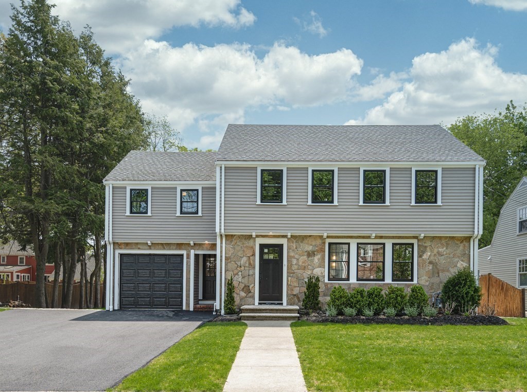 61 Sheffield Road Melrose, MA 02176 - Photo 2 of 21 a front view of a house with garden