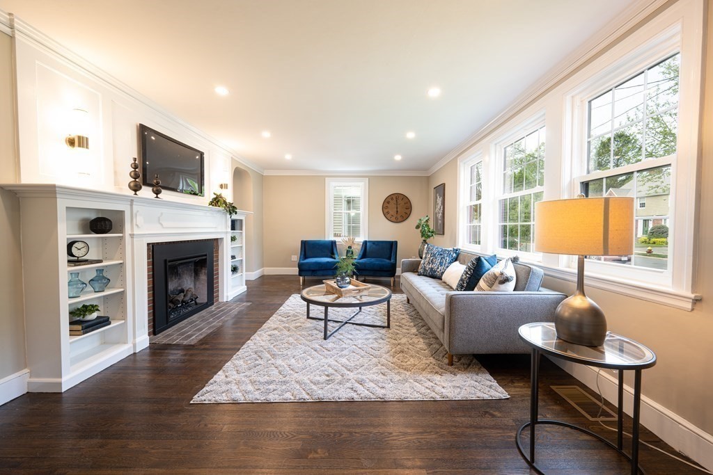 61 Sheffield Road Melrose, MA 02176 - Photo 5 of 21 a living room with furniture fireplace and flat screen tv